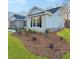 A well landscaped yard surrounds this lovely home with brick accents at 5331 Tuscany Dr, Douglasville, GA 30135