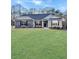Charming single-story home with stone accents and a well-manicured lawn at 5331 Tuscany Dr, Douglasville, GA 30135