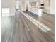 Bright, open-concept kitchen featuring a large island and stainless steel appliances at 5331 Tuscany Dr, Douglasville, GA 30135