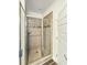 Modern shower with glass door and decorative tile, creating a spa-like atmosphere at 5331 Tuscany Dr, Douglasville, GA 30135