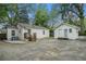 Exterior view of the backyard with a secondary structure and partial view of the home at 581 Taylor Se Dr, Smyrna, GA 30080