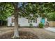 Exterior showcases a charming home with updated siding, wood shutters, and a bright front door at 581 Taylor Se Dr, Smyrna, GA 30080