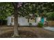 Exterior showcases a charming home with updated siding, wood shutters, and a bright front door at 581 Taylor Se Dr, Smyrna, GA 30080