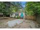 Charming single-story home with a bright blue front door and gravel driveway at 581 Taylor Se Dr, Smyrna, GA 30080