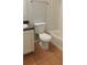 Modest bathroom with tile flooring featuring a toilet and a combined shower and tub at 162 Odyssey Turn, Conyers, GA 30012