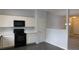 Bright kitchen opens to dining and living areas at 162 Odyssey Turn, Conyers, GA 30012