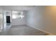 Spacious living area with hardwood floors and neutral paint at 162 Odyssey Turn, Conyers, GA 30012
