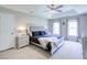Spacious bedroom with plush carpet and recessed lighting at 1812 Riverton Dr, Suwanee, GA 30024