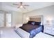 Bedroom showcasing a tray ceiling and large bedroom at 1812 Riverton Dr, Suwanee, GA 30024