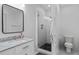 Updated bathroom with a walk-in shower, modern fixtures, and a sleek vanity at 2284 Dauphine St, East Point, GA 30344