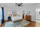 Serene bedroom with a ceiling fan, hardwood floors, and stylish area rug at 2284 Dauphine St, East Point, GA 30344