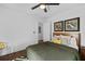 Spacious bedroom features warm hardwood floors and inviting decor at 2284 Dauphine St, East Point, GA 30344