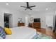 Bedroom with natural light, hardwood floors, and ensuite bathroom and walk-in closet at 2284 Dauphine St, East Point, GA 30344