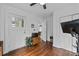Bright bedroom with exercise equipment, hardwood floors, and lots of natural light at 2284 Dauphine St, East Point, GA 30344