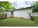 Home exterior features an expansive yard and privacy fence at 2284 Dauphine St, East Point, GA 30344