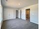 Large bedroom with double closets and soft carpeting at 5321 Tuscany Dr, Douglasville, GA 30135