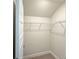 Walk-in closet with wire shelving for organized storage at 5321 Tuscany Dr, Douglasville, GA 30135