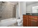 Comfortable bathroom with tiled shower, vanity, and fixtures, offering a functional and appealing space at 75 High Top Ln, Atlanta, GA 30328