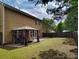 Spacious backyard with a well-maintained lawn, patio, and gazebo, perfect for outdoor enjoyment and entertaining at 1117 Balvaird Dr, Lawrenceville, GA 30045