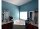 The main bathroom features a soaking tub, dual sinks, and ample counterspace at 1117 Balvaird Dr, Lawrenceville, GA 30045
