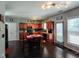 Spacious eat-in kitchen with stainless appliances, ample cabinet space, and dark wood flooring at 1117 Balvaird Dr, Lawrenceville, GA 30045