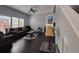 Bright living room with vaulted ceiling, dark wood floors, and a charming fireplace at 1117 Balvaird Dr, Lawrenceville, GA 30045