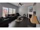 Bright living room with vaulted ceiling, dark wood floors, and a charming fireplace at 1117 Balvaird Dr, Lawrenceville, GA 30045