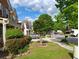 Serene street view showcasing well-maintained lawns, mature trees, and charming homes in a quiet neighborhood at 1117 Balvaird Dr, Lawrenceville, GA 30045