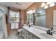 Bathroom featuring large double sink vanity and large mirror at 375 Spindle Ct, Sandy Springs, GA 30350