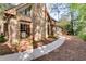 Charming brick home with large windows and manicured landscaping, offering great curb appeal at 375 Spindle Ct, Sandy Springs, GA 30350
