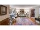 Cozy living room with a large area rug and bay window that provides natural light at 375 Spindle Ct, Sandy Springs, GA 30350