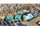 Aerial view of community amenities including tennis courts, pool, and surrounding greenery at 186 Greenbrier Way, Canton, GA 30114