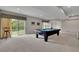 Finished basement with a pool table, neutral-toned walls, and natural light at 186 Greenbrier Way, Canton, GA 30114