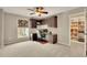 Bedroom with built-in cabinets, workspace, and a large closet at 186 Greenbrier Way, Canton, GA 30114