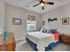Cozy bedroom featuring a comfortable bed, side tables, and charming decor, creating a relaxing space at 186 Greenbrier Way, Canton, GA 30114