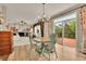 Bright dining area next to living room with access to deck through sliding glass door at 186 Greenbrier Way, Canton, GA 30114