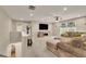 Cozy upstairs living room featuring a comfortable sectional sofa and large screen TV at 186 Greenbrier Way, Canton, GA 30114