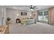 Spacious main bedroom with neutral colors, plush carpet, and large windows at 186 Greenbrier Way, Canton, GA 30114