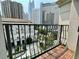 Balcony view overlooking a landscaped area and surrounding cityscape at 199 14Th Ne St # 710, Atlanta, GA 30309