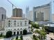 Balcony view overlooking courtyard with surrounding city buildings at 199 14Th Ne St # 710, Atlanta, GA 30309
