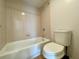 Bathroom features a shower-tub combo with beige tile surround at 199 14Th Ne St # 710, Atlanta, GA 30309
