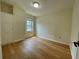 Bright bedroom with hardwood floors, natural light, and a closet at 199 14Th Ne St # 710, Atlanta, GA 30309