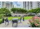 Beautiful garden area with seating and lush greenery, offering a relaxing outdoor space at 199 14Th Ne St # 710, Atlanta, GA 30309