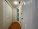 Hallway with hardwood floors and white doors and closet space at 199 14Th Ne St # 710, Atlanta, GA 30309