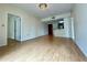 Spacious living room with hardwood floors and a view to a kitchen bar at 199 14Th Ne St # 710, Atlanta, GA 30309