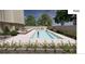 Inviting outdoor pool with lounge chairs for relaxing and enjoying the sun at 199 14Th Ne St # 710, Atlanta, GA 30309