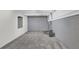 A spacious unfinished basement area featuring painted walls and carpeted flooring at 2551 Park Se Rd, Smyrna, GA 30080