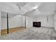 Spacious basement with carpeted and wood flooring with a decorative hutch at 2551 Park Se Rd, Smyrna, GA 30080