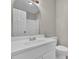 Bathroom featuring a modern sink, vanity and toilet at 2551 Park Se Rd, Smyrna, GA 30080