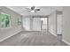 Bright bedroom with soft carpet, barn door access, and views from the windows at 2551 Park Se Rd, Smyrna, GA 30080
